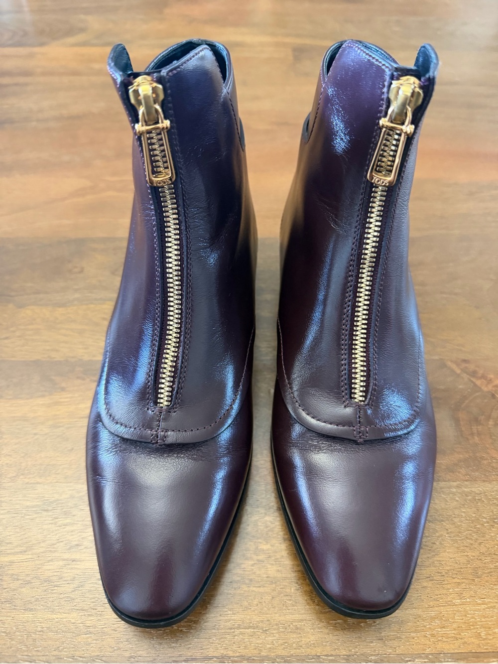 Tod's Burgundy Leather Ankle Zip Booties with Gold Zipper